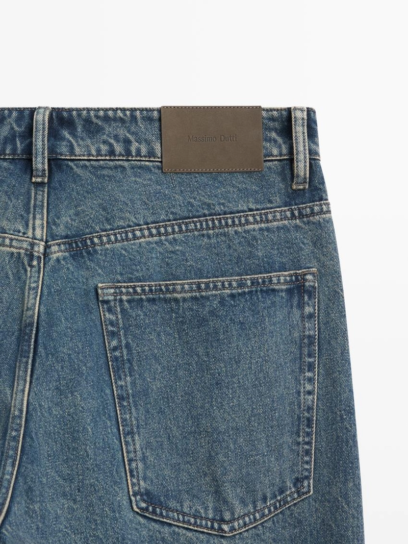 Джинсы с широкими штанинами