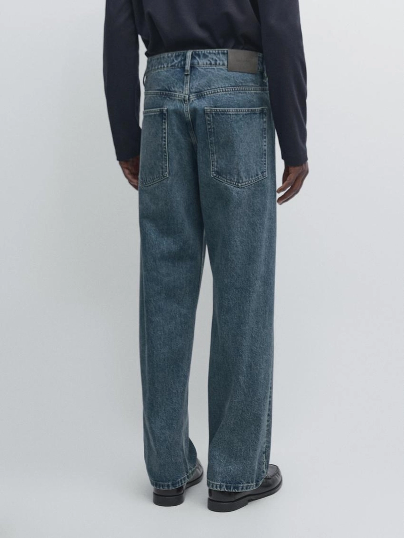 Джинсы с широкими штанинами