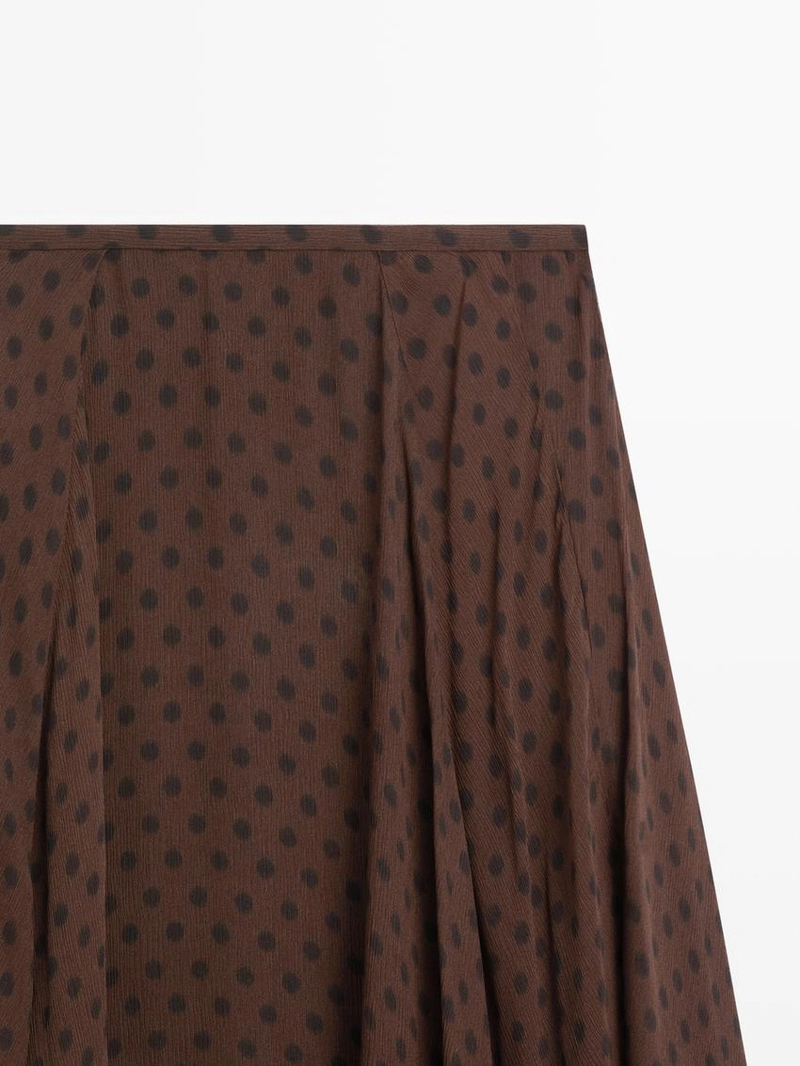 Юбка-миди в горох с расклешенным подолом