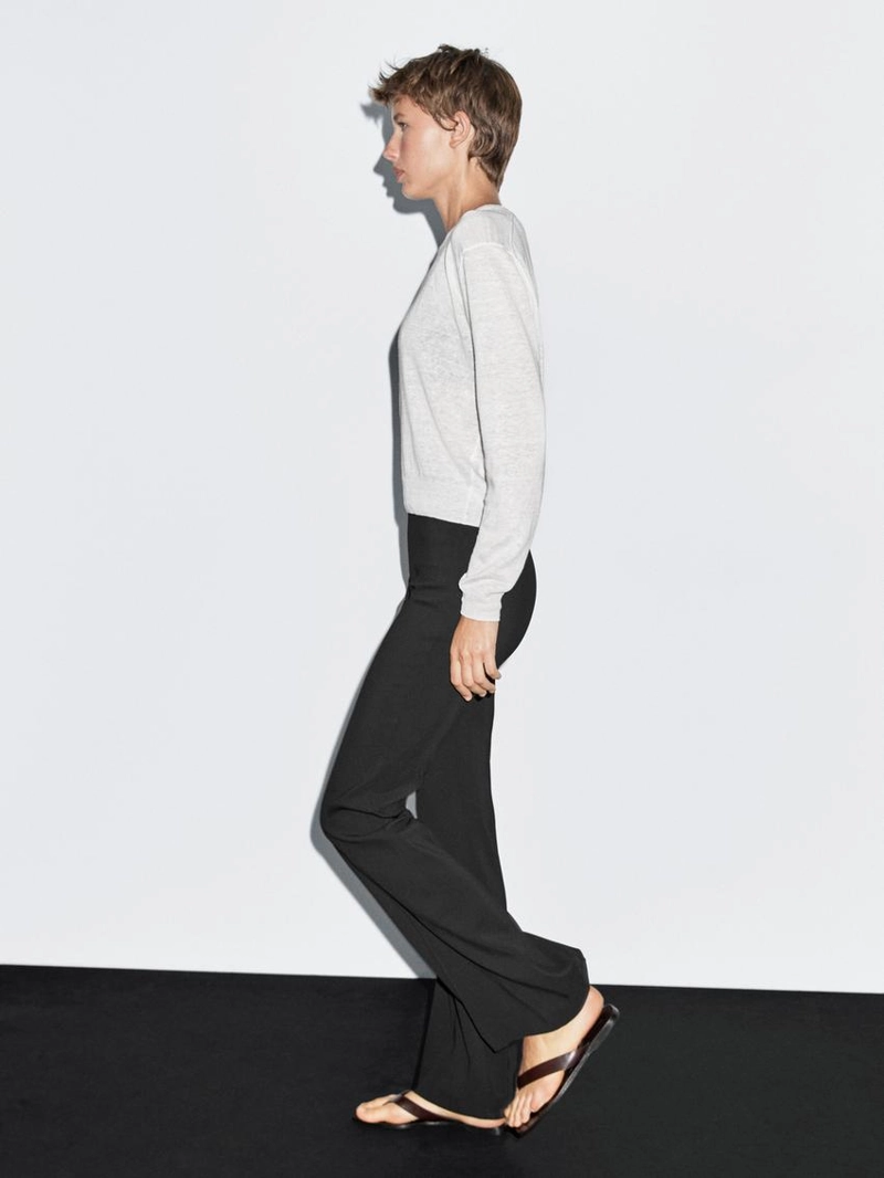 Брюки с расклешенными штанинами и карманом