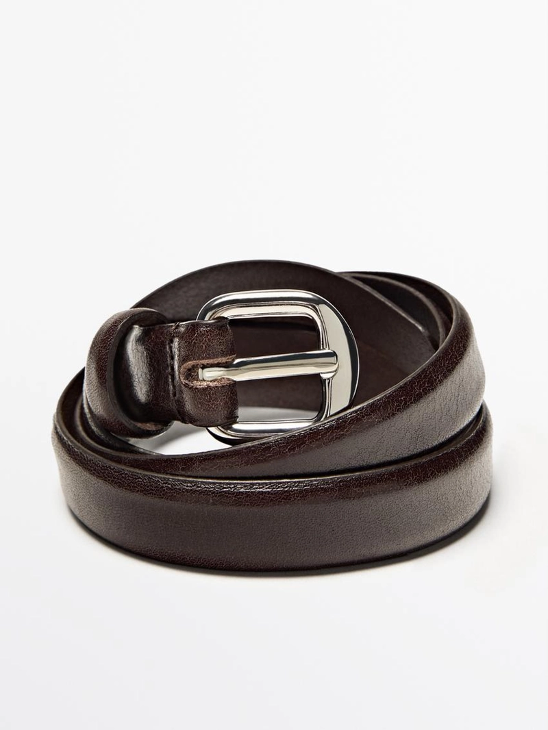 Кожаный пояс с изогнутой пряжкой