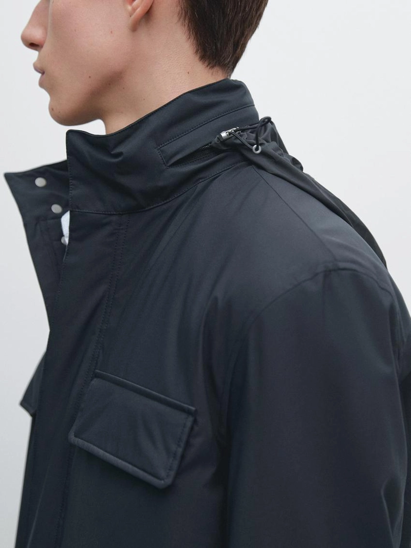 Пуховик с карманами и водоотталкивающей отделкой