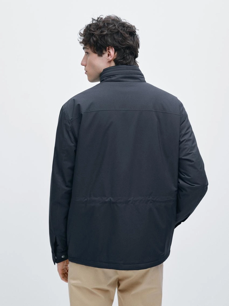 Пуховик с карманами и водоотталкивающей отделкой