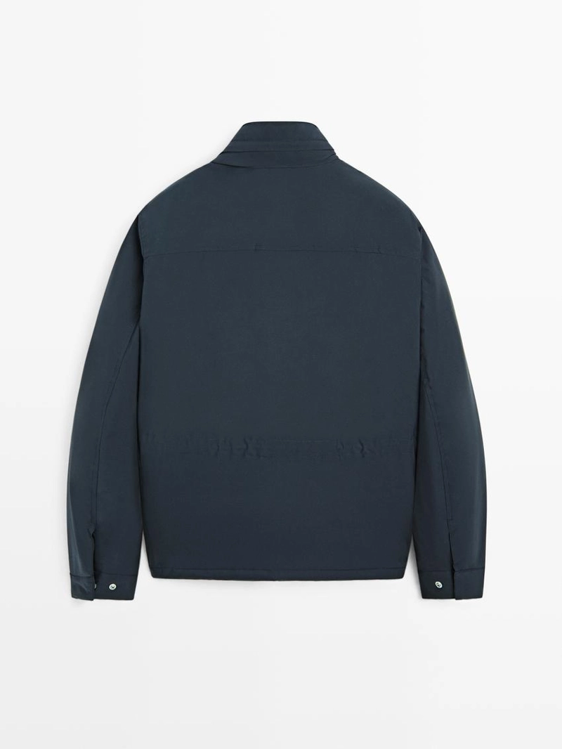 Пуховик с карманами и водоотталкивающей отделкой