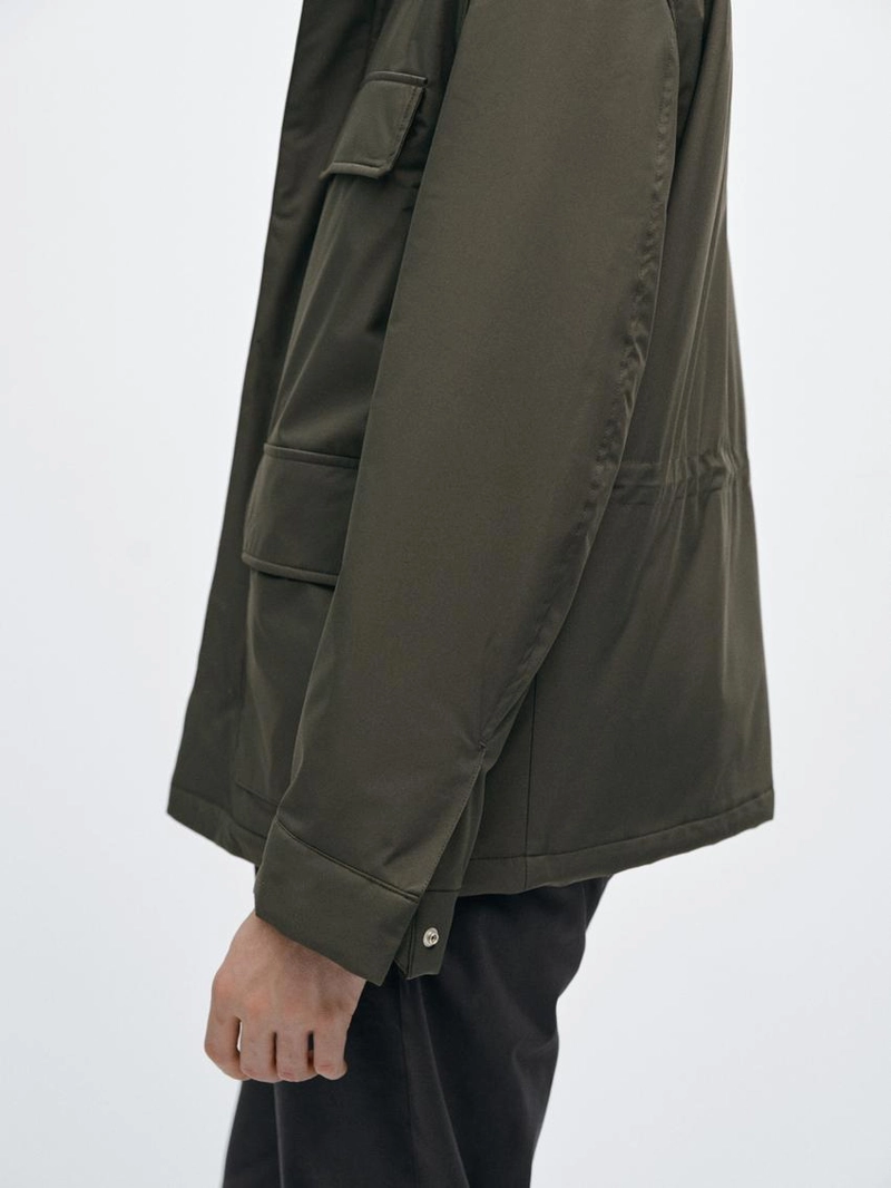 Пуховик с карманами и водоотталкивающей отделкой