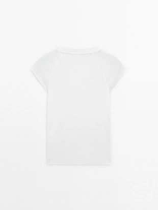 Хлопковая футболка с короткими реглановыми рукавами- Заказать в России