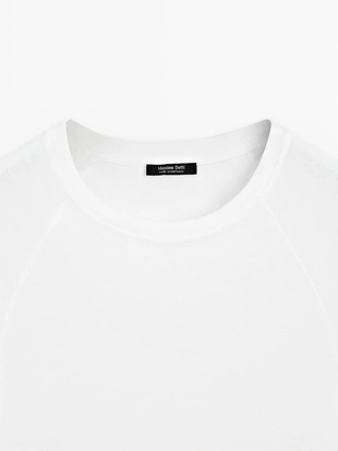 Хлопковая футболка с короткими реглановыми рукавами- Заказать в России