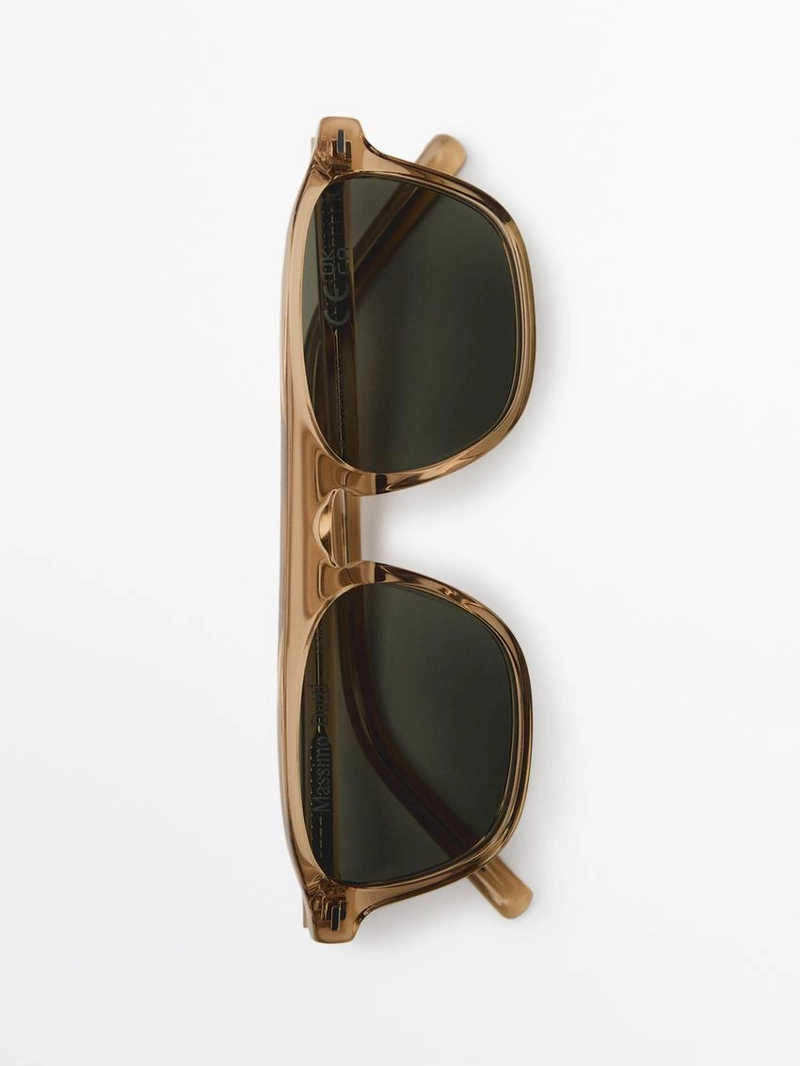 Солнечные очки в форме буквы d