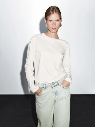 Джинсы с широкими штанинами и средней посадкой- Заказать в России