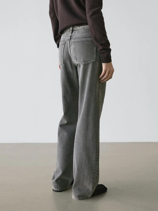 Джинсы с широкими штанинами и средней посадкой- Заказать в России