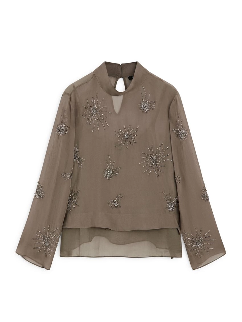 Блузка с вышивкой из полупрозрачной ткани