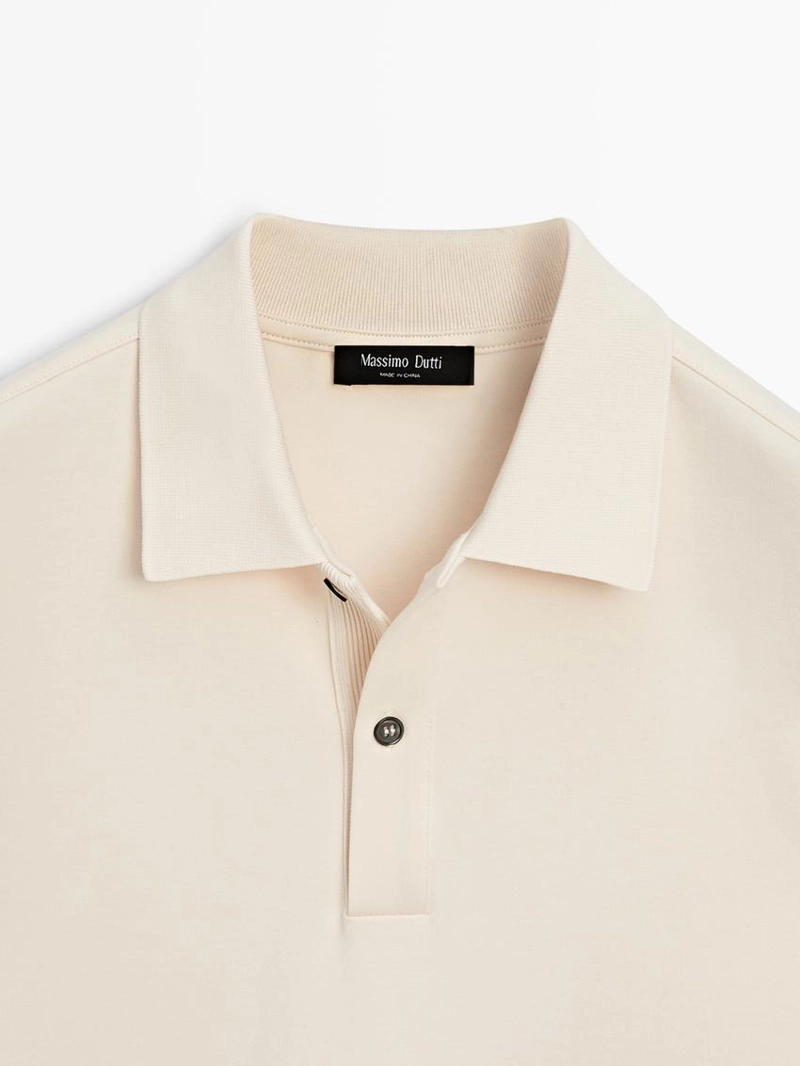 Поло с длинным рукавом и ребристыми деталями