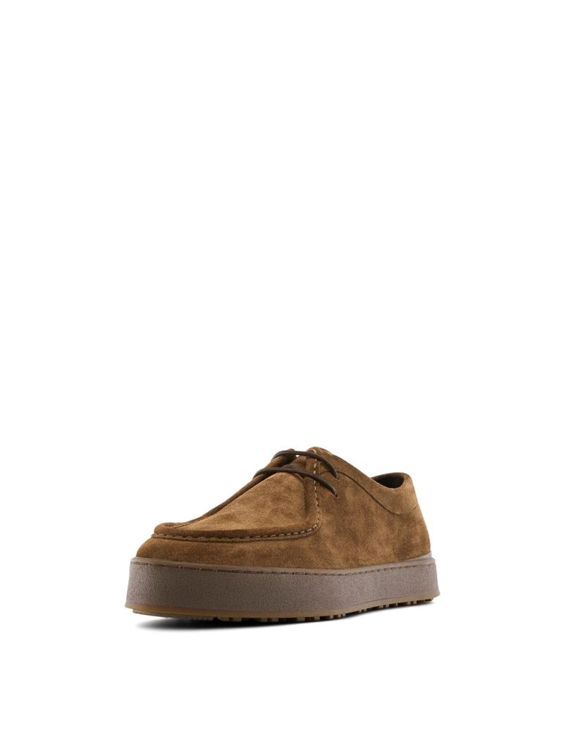 Кожаные туфли с мокасиновым мысом и массивной подошвой