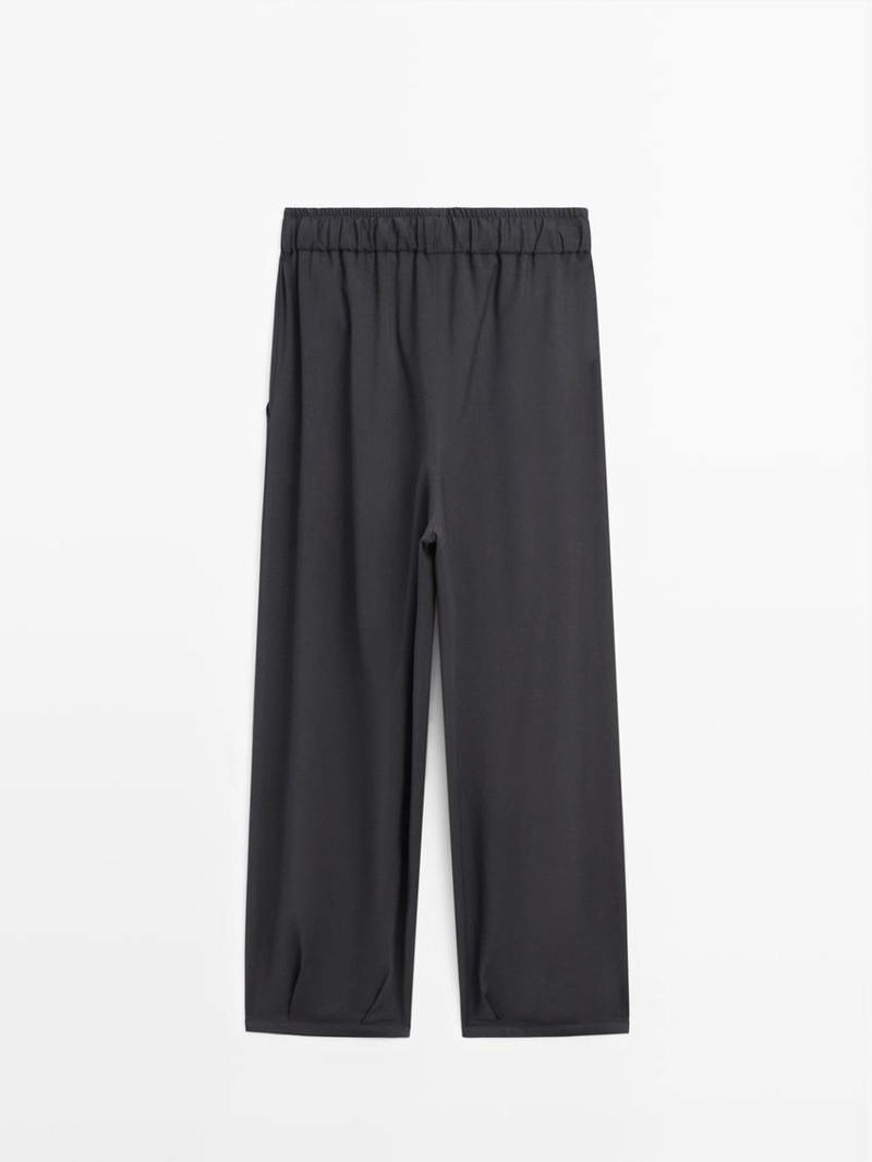 Широкие брюки с объемными складками