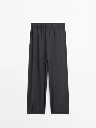 Широкие брюки с объемными складками- Заказать в России