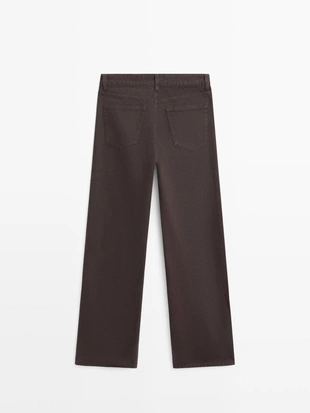 Джинсы с широкими брючинами- Заказать в России