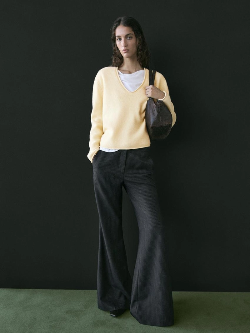 Брюки с зауженными штанинами в полоску