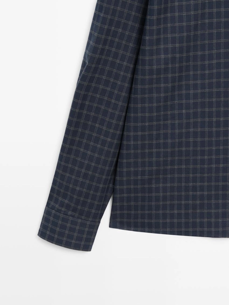 Рубашка в клетку свободного кроя