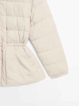 Пуховик с водоотталкивающим покрытием- Заказать в России