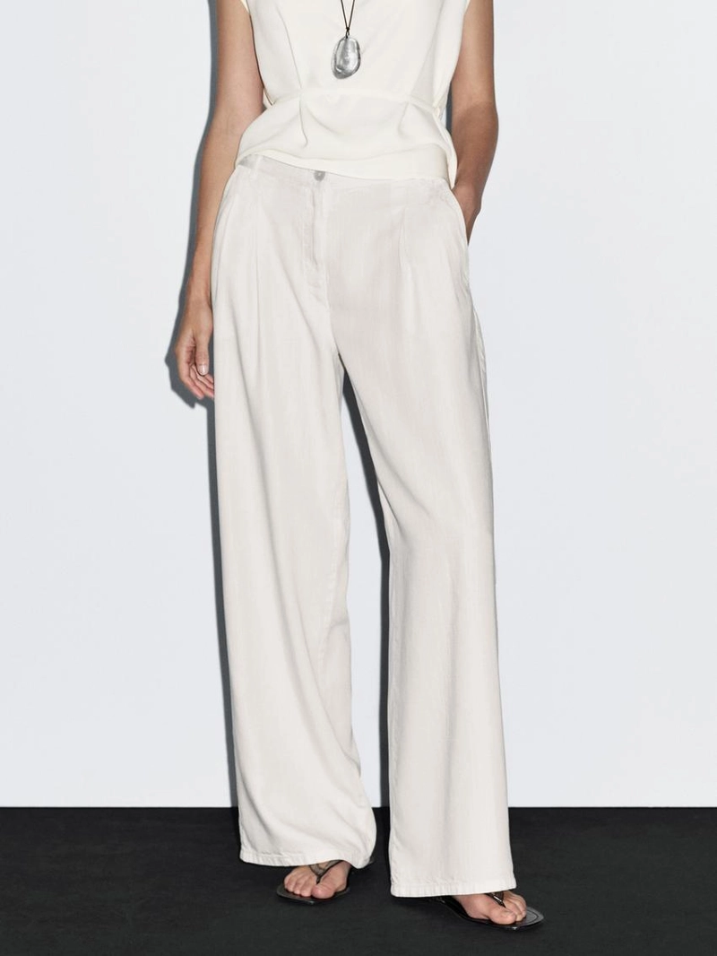 Брюки с широкими брючинами и двойными стрелками