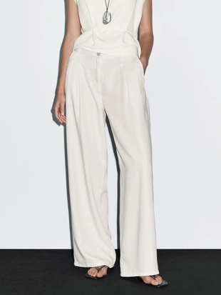 Брюки с широкими брючинами и двойными стрелками- Заказать в России