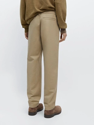 Хлопковые брюки с посадкой джоггер- Заказать в России