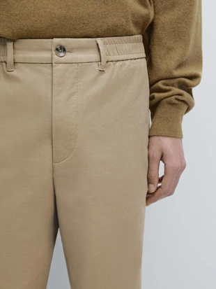 Хлопковые брюки с посадкой джоггер- Заказать в России