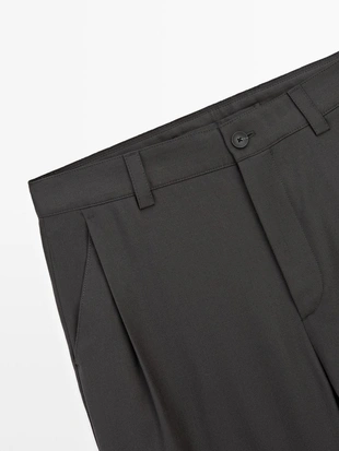 Брюки свободного кроя из шерсти- Заказать в России