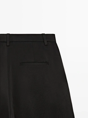 Брюки свободного кроя с запахом- Заказать в России