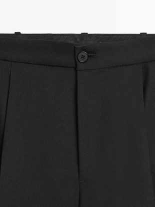 Брюки с линией ластовицы из текстиля с эффектом плиссировки- Заказать в России