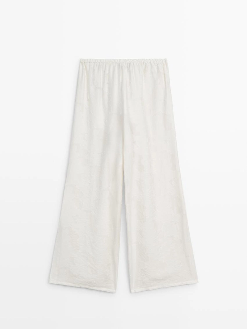 Широкие брюки из текстильной ткани со вставкой