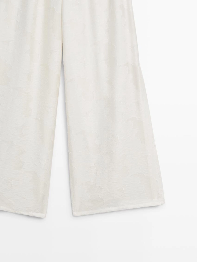 Широкие брюки из текстильной ткани со вставкой