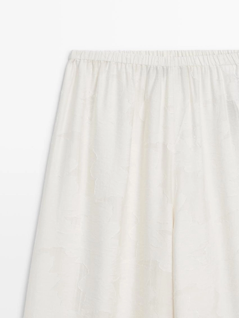 Широкие брюки из текстильной ткани со вставкой