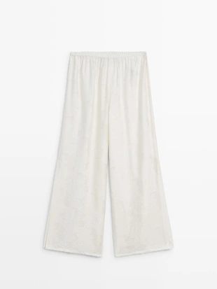 Широкие брюки из текстильной ткани со вставкой- Заказать в России