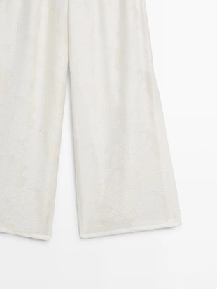 Широкие брюки из текстильной ткани со вставкой- Заказать в России