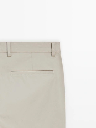 Брюки из хлопка в узком крое- Заказать в России