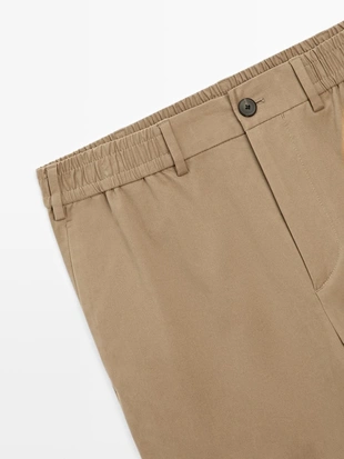 Брюки из хлопкового смесового материала в стиле джоггер- Заказать в России