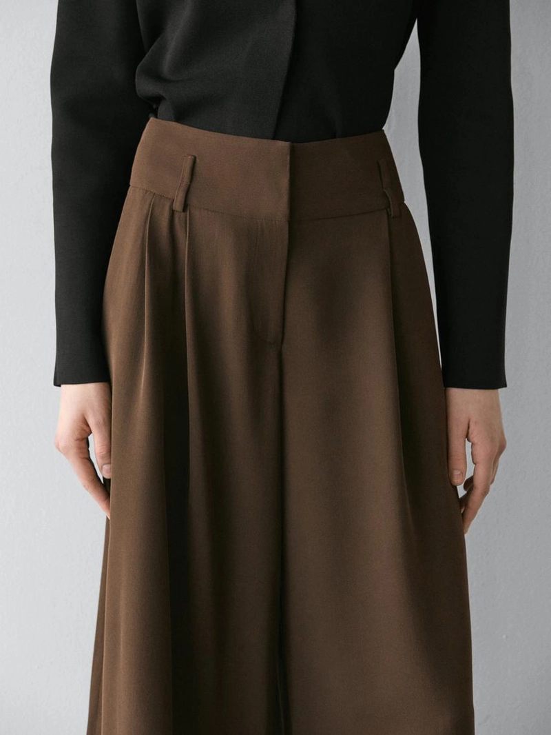 Длинные бермуды с подвернутыми краями