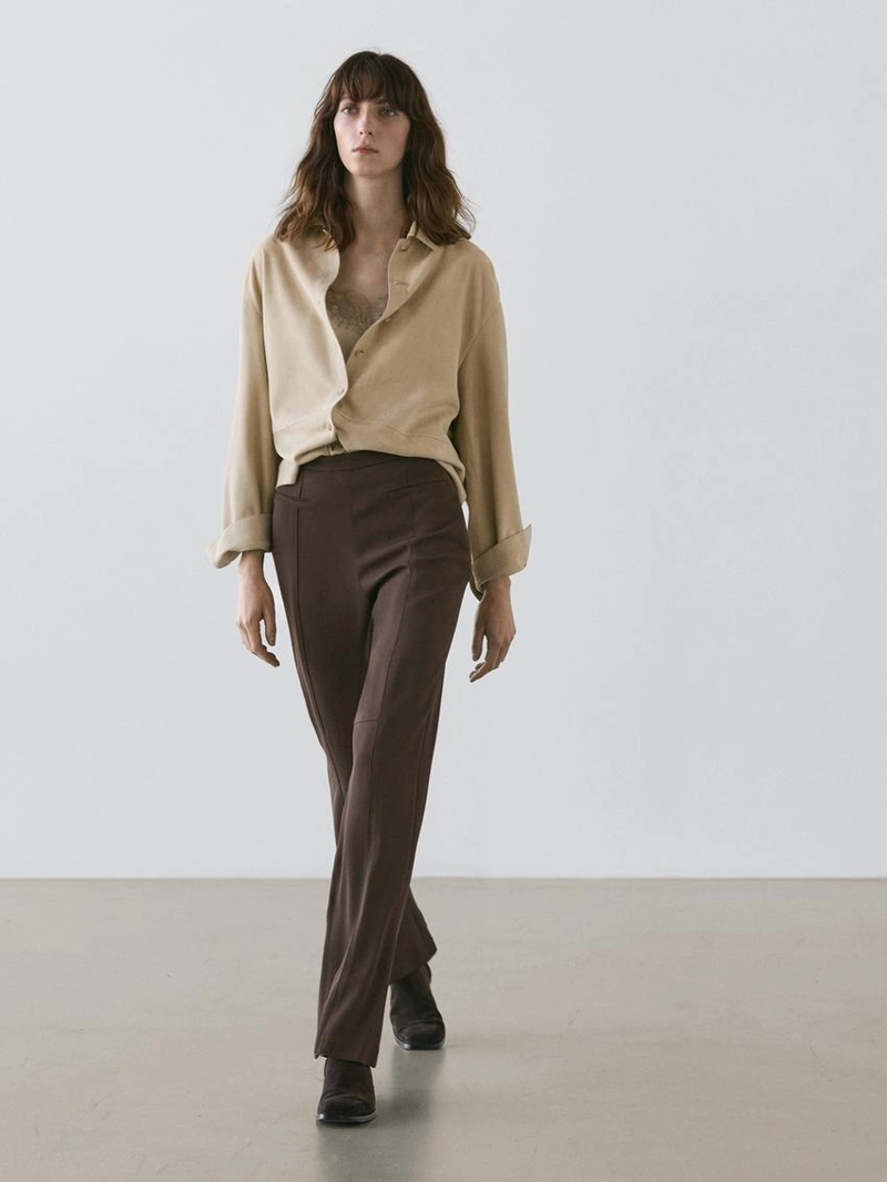 Брюки-клеш с карманом