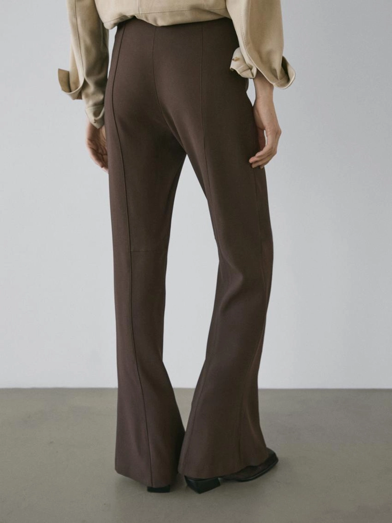 Брюки-клеш с карманом