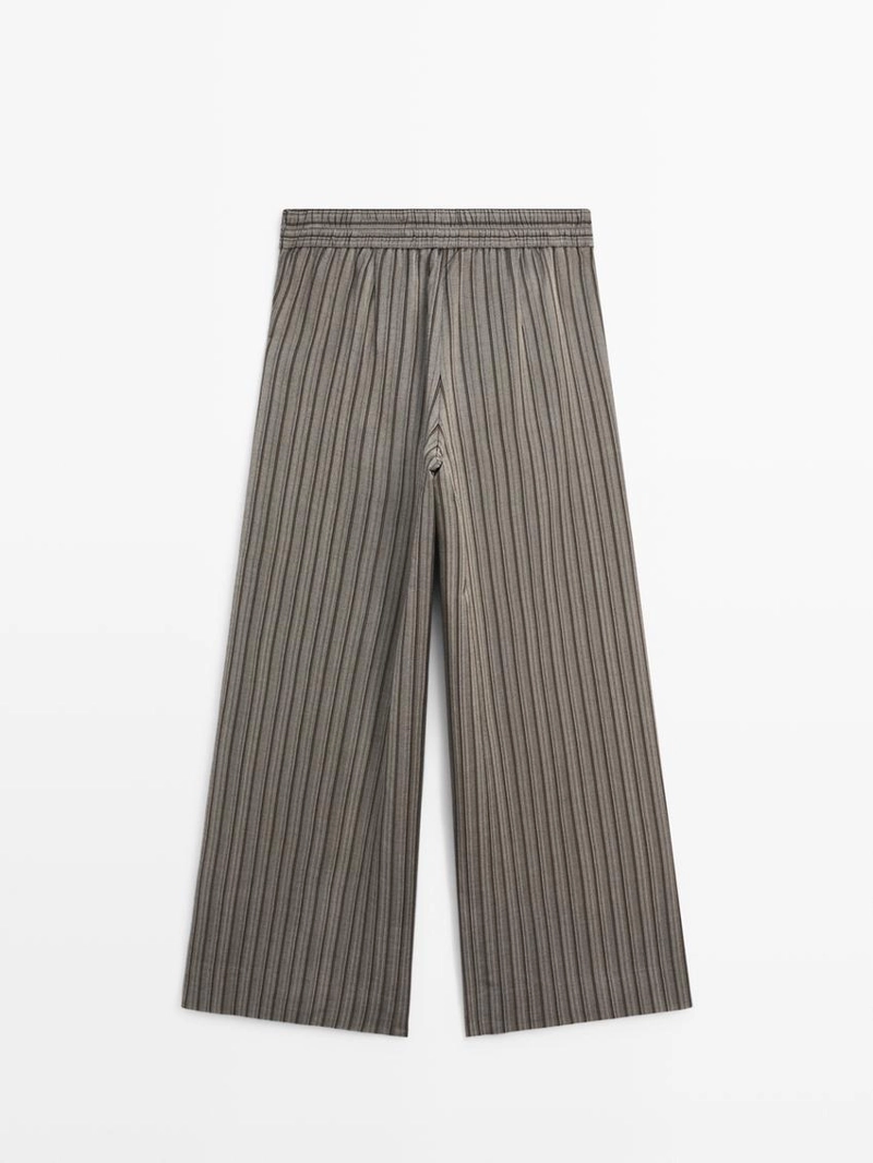 Брюки широкие с полосатыми деталями