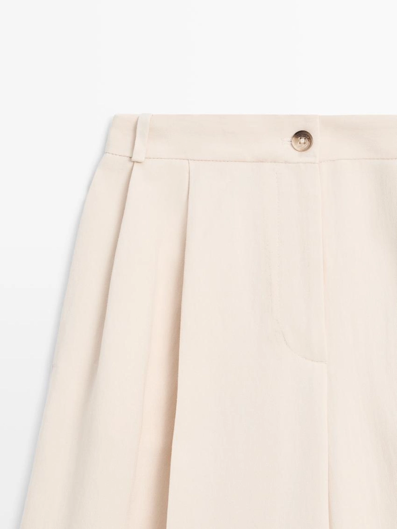 Брюки с манжетами на завышенной талии