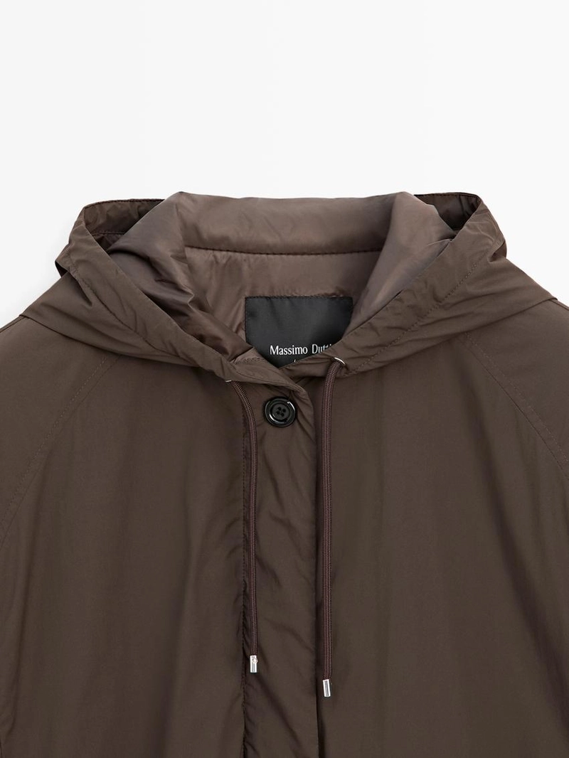 Пуховик с высоким воротником