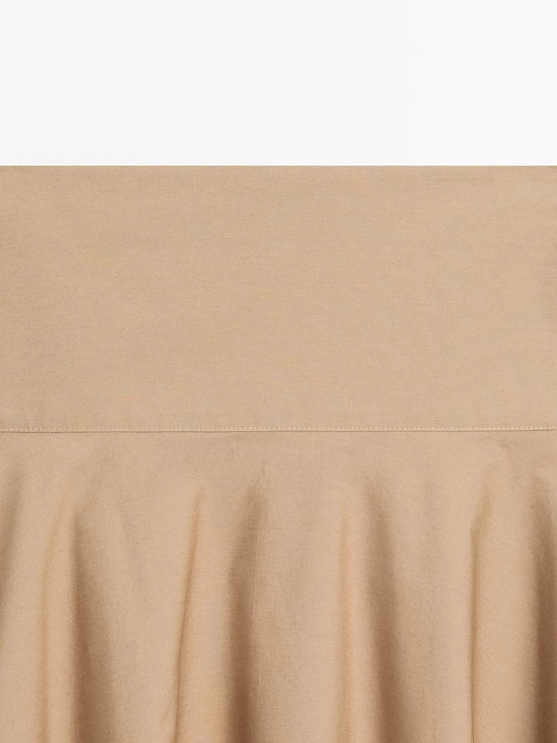 Юбка миди с оборкой на поясе