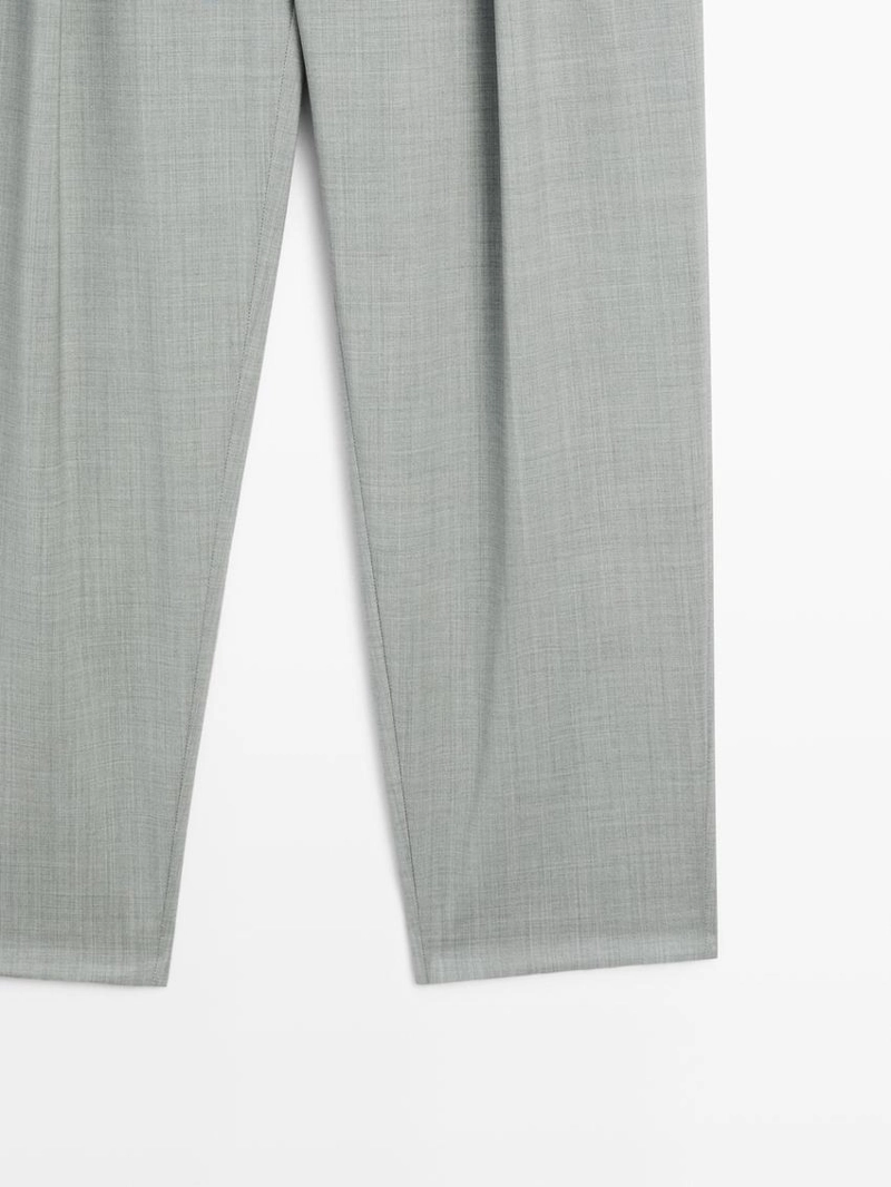 Брюки со складками и стрелками