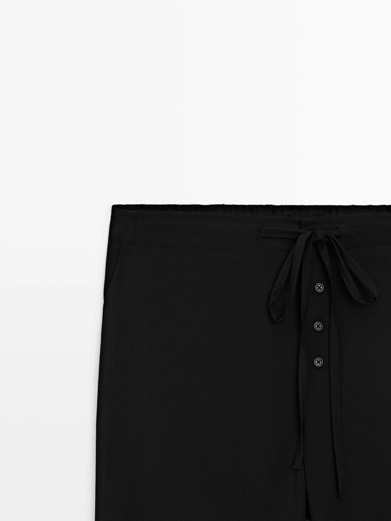 Шерстяные брюки саруэль с деталью завязки