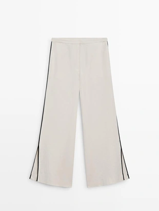 Брюки из льна с контрастной отделкой- Заказать в России