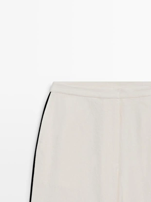 Брюки из льна с контрастной отделкой- Заказать в России