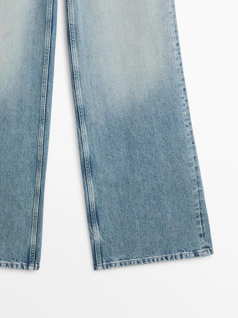 Джинсы с высокой посадкой и широкими брючинами