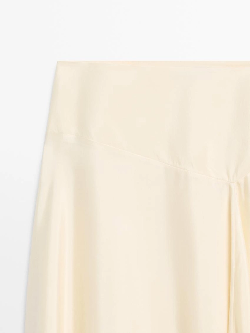 Асимметричная юбка с деталями из кружева